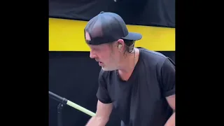 Lars Ulrich give drumstick to a fan in Hamburg