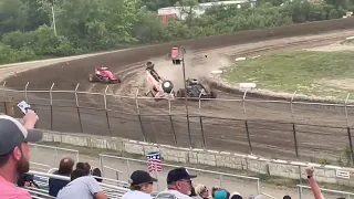 Wisconsin Wingless Sprint Series car clips the corner and goes airborne/ rolls