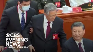 Former Chinese President Hu Jintao unexpectedly led out of Communist party congress
