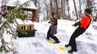 Hauling a Wood Stove on a Frozen River to Our Remote Cabin