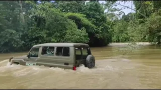 Toyota LC Powered Wet Crossing in PNG