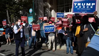 Trump and Biden supporters protest outside the Philadelphia Convention Center