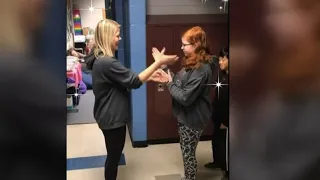 Teacher's custom handshakes go viral