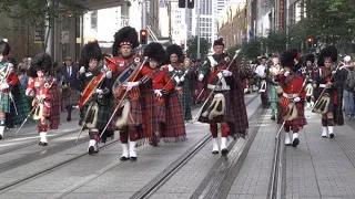 MASSED PIPE BANDS RETURN TO THE CENOTAPH ANZAC DAY