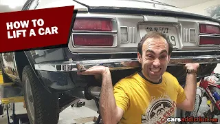 Lifting a Datsun 260Z with a Hydraulic Jack