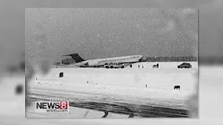 Plane skids off runway at LaGuardia, crashes through fence