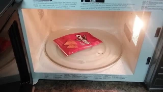 shrinking a doritos bag in the microwave