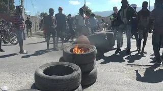 Police protest in Haiti after six officers killed | AFP