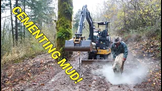 Using cement to harden fresh fill mud during months of rain.  Developing spring hill campground.