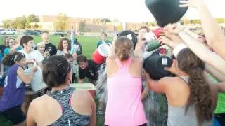 Teacher Gets Drenched by Marching Band for Charity!