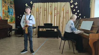 "Cantina Band"  J. Williams, виконує Євгеній Стасюк .