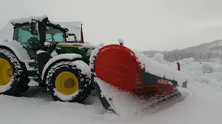 John Deere plowing 5.5 inches of snow.