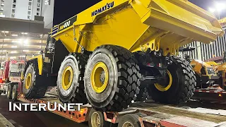 Komatsu HM400 on the Move - Loading and Transporting Articulated Truck