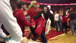 NC State fans storm the court