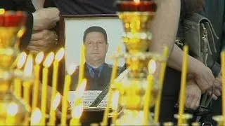 Ukraine: Funeral held for slain traffic police chief in divided Mariupol