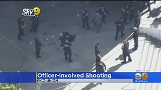 LAPD Officers Shoot Allegedly Armed Man Outside Olympic Station