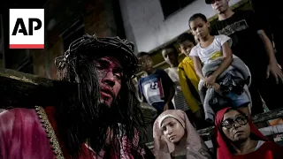 Via Crucis play is performed in Rio de Janeiro on Good Friday
