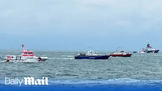 British cargo ship sinks: Moment P&O tell passengers they're looking for 'people in the water'