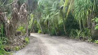 Maldives, Dhigurah Island stroll from town to the end of sand bank beach, rain to cloudy