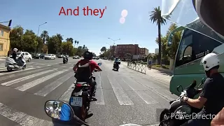 A Scream of Scooters in Saville, Spain