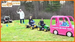 Tow truck tug of war challenge and power wheels tug of war tournament. How traction works | Kid Crew