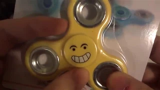 UNBOXiNG REViEW OF STRESS GEAR Yellow emoji Fidget Spinner