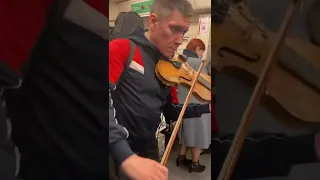 Уличный скрипач