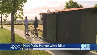 Man Tows Home With Bicycle