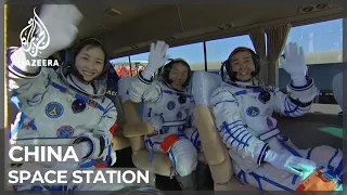 China launches astronauts to complete new space station