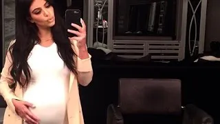 Kim Kardashian Shows Off Her Growing Baby Bump!