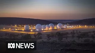 What does the US Pine Gap spy base do?