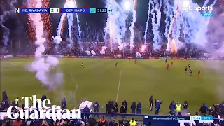 Fans set off barrage of fireworks in celebration before end of match in Argentina