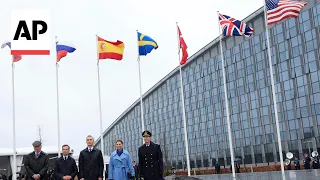 Moment Sweden’s flag is raised at NATO headquarters