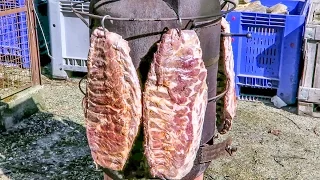 Italian Massive Ribs Prepared and Roasted on a Stove and a Grill. Street Food of Italy