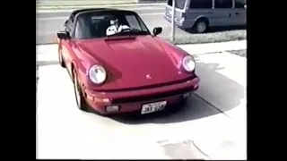 Selena driving her red Porsche in Corpus Christi, Texas