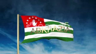 Abkhazia Flag Slider Style With Title. Waving In The Wind With Cloud Background