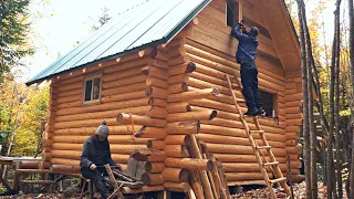 Building A Log Cabin | Ep. 40 | First Windows | Finishing the stone hearth | Gathering firewood