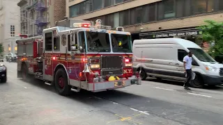 FDNY ENGINE 23 RESPONDING TO A REPORT OF A FIRE