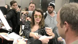 Milla Jovovich Fans Get A Little Too Up Close And Personal At LAX