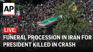 LIVE: A funeral procession is held in Iran for president, others killed in helicopter crash