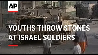 Youths throw stones at Israel soldiers