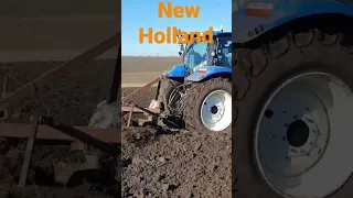 New Holland с плугом