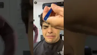 Noah Centineo waxing his eyebrows with Lana Condor