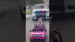Toddler in pink mini convertible is pulled over in police prank