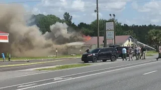 One person in custody following motel fire in Bradford County, bomb squad on scene