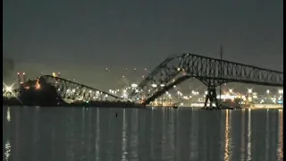 Cargo ship hits Baltimore's Key Bridge, bringing it down. At least 7 people believed to be in water