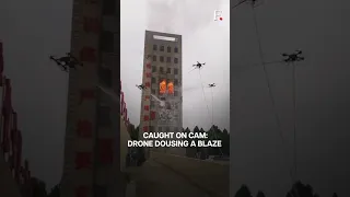 Watch: Chinese Drones Douse Fire in a Multi-Storey Building