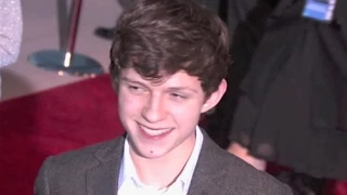 New 'Spider-Man' TOM HOLLAND laughs at relentless photographer at film festival