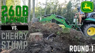 Cherry Stump vs. The John Deere 2025r 260B  Backhoe - Round 1 - Ding Ding