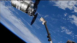 Cygnus spacecraft captured by space station's robotic arm